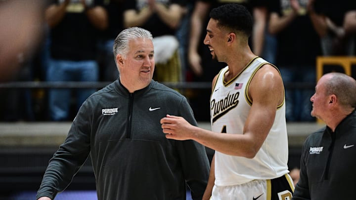 Purdue Boilermakers head coach Matt Painter shares a moment with forward Trey Kaufman-Renn (4) 