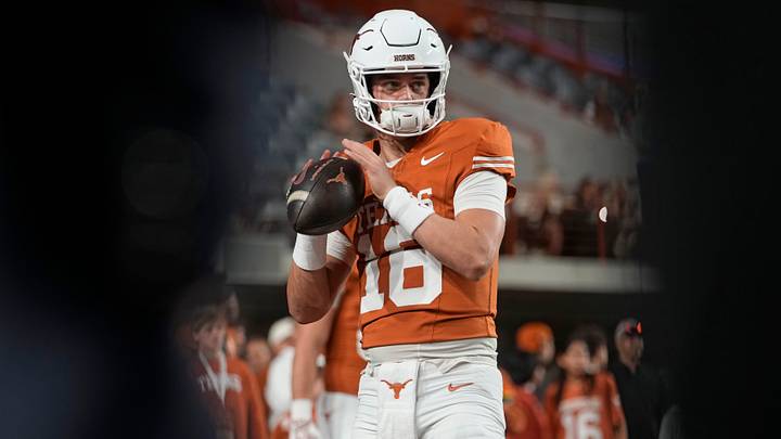 Texas Longhorns quarterback Arch Manning warms up before a game against the Texas A&M Aggies at Darrell K Royal-Texas Memorial Stadium. 