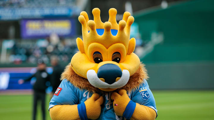 Apr 5, 2025; Kansas City, Missouri, USA; Kansas City Royals mascot Slugger reacts to the crowd during the seventh inning against the Baltimore Orioles at Kauffman Stadium. Mandatory Credit: William Purnell-Imagn Images