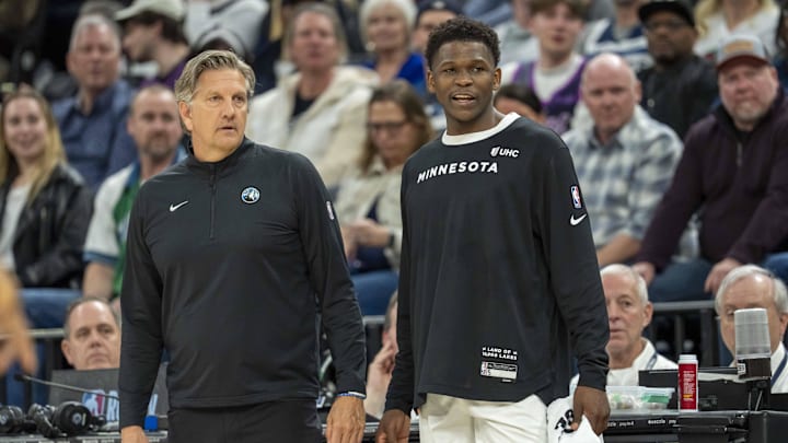 Mar 9, 2025; Minneapolis, Minnesota, USA; Minnesota Timberwolves head coach Chris Finch and Minnesota Timberwolves guard Anthony Edwards (5) looks on during the second half against the San Antonio Spurs at Target Center.