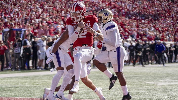 Oct 26, 2024; Bloomington, Indiana, USA; Indiana Hoosiers quarterback Tayven Jackson (2) runs the ball for a touchdown during the fourth quarter against the Washington Huskies at Memorial Stadium. Mandatory Credit: Jacob Musselman-Imagn Images