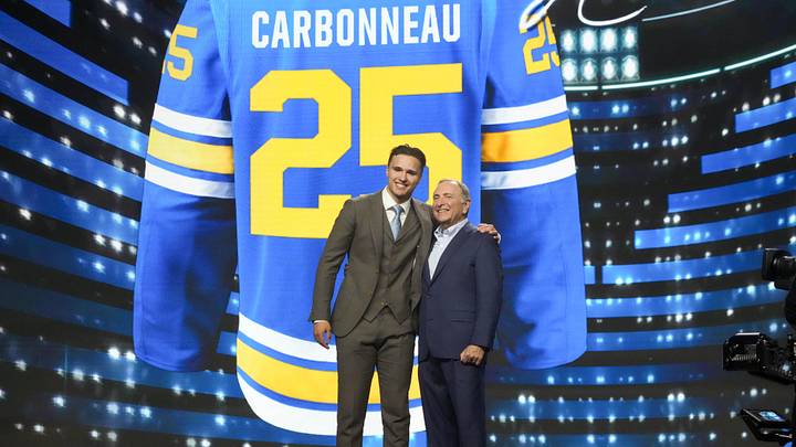 Jun 27, 2025; Los Angeles, California, USA; Justin Carbonneau is selected as the 19th overall pick to the St. Louis Blues in the first round of the 2025 NHL Draft at Peacock Theater. Mandatory Credit: Kirby Lee-Imagn Images