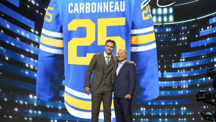 Jun 27, 2025; Los Angeles, California, USA; Justin Carbonneau is selected as the 19th overall pick to the St. Louis Blues in the first round of the 2025 NHL Draft at Peacock Theater. Mandatory Credit: Kirby Lee-Imagn Images