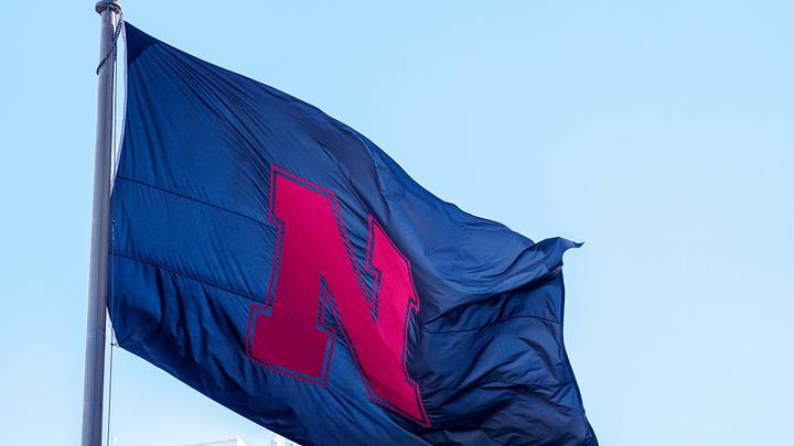 Nov 1, 2025; Lincoln, Nebraska, USA; A black Nebraska Cornhuskers flag waves outside the stadium before the game against the Southern California Trojans at Memorial Stadium. Mandatory Credit: Dylan Widger-Imagn Images Nov 1, 2025; Lincoln, Nebraska, USA; A black Nebraska Cornhuskers flag waves outside the stadium before the game against the Southern California Trojans at Memorial Stadium. Mandatory Credit: Dylan Widger-Imagn Images