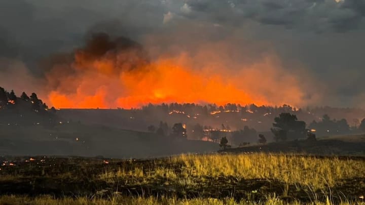 Wildfire burning through a family ranch near Gillette, Wyoming Wildfire burning through a family ranch near Gillette, Wyoming