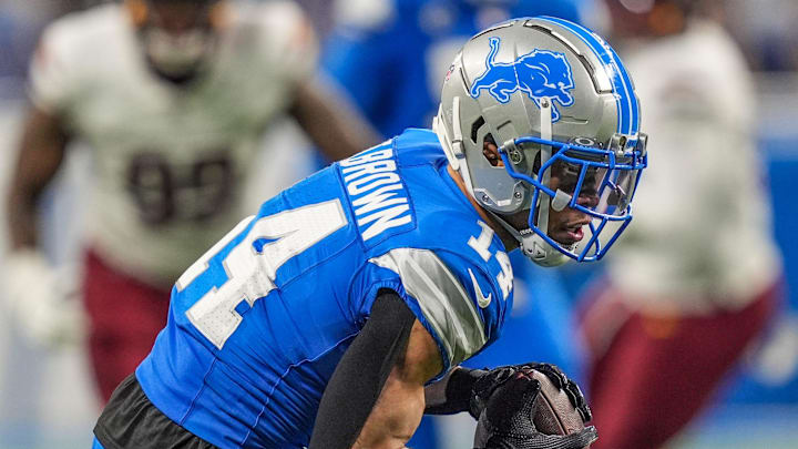 Detroit Lions wide receiver Amon-Ra St. Brown (14) catches a pass late in the fourth quarter against Commanders Detroit Lions wide receiver Amon-Ra St. Brown (14) catches a pass late in the fourth quarter against Commanders