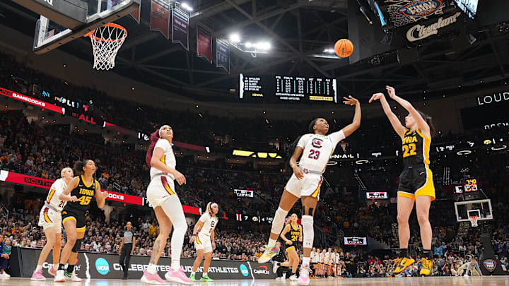 Iowa Hawkeyes guard Caitlin Clark (22) shoots the ball as South Carolina Gamecocks guard Bree Hall (23) defends during the NCAA Tournament championship basketball game at Rocket Mortgage Fieldhouse, Sunday, April 7, 2024 in Cleveland. Iowa Hawkeyes guard Caitlin Clark (22) shoots the ball as South Carolina Gamecocks guard Bree Hall (23) defends during the NCAA Tournament championship basketball game at Rocket Mortgage Fieldhouse, Sunday, April 7, 2024 in Cleveland.