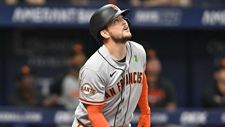 May 1, 2026; St. Petersburg, Florida, USA; San Francisco Giants catcher Patrick Bailey (14) hits a fly ball during the third inning against Tampa Bay Rays at Tropicana Field. Mandatory Credit: Pablo Robles-Imagn Images