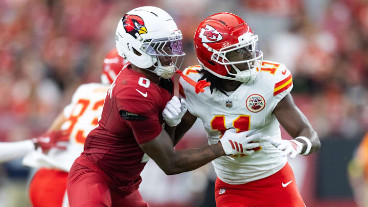 Aug 9, 2025; Glendale, Arizona, USA; Arizona Cardinals cornerback Will Johnson (0) against Kansas City Chiefs wide receiver Jalen Royals (11) during a preseason NFL game at State Farm Stadium. Mandatory Credit: Mark J. Rebilas-Imagn Images Aug 9, 2025; Glendale, Arizona, USA; Arizona Cardinals cornerback Will Johnson (0) against Kansas City Chiefs wide receiver Jalen Royals (11) during a preseason NFL game at State Farm Stadium. Mandatory Credit: Mark J. Rebilas-Imagn Images