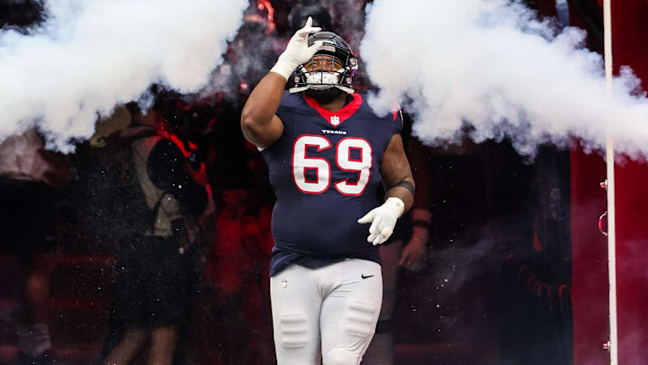 Dec 3, 2023; Houston, Texas, USA; Houston Texans guard Shaq Mason (69) is introduced before playing against the Denver Broncos at NRG Stadium. Mandatory Credit: Thomas Shea-Imagn Images