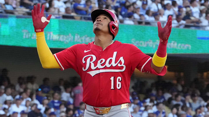 Cincinnati Reds right fielder Noelvi Marte (16) crosses home plate 
