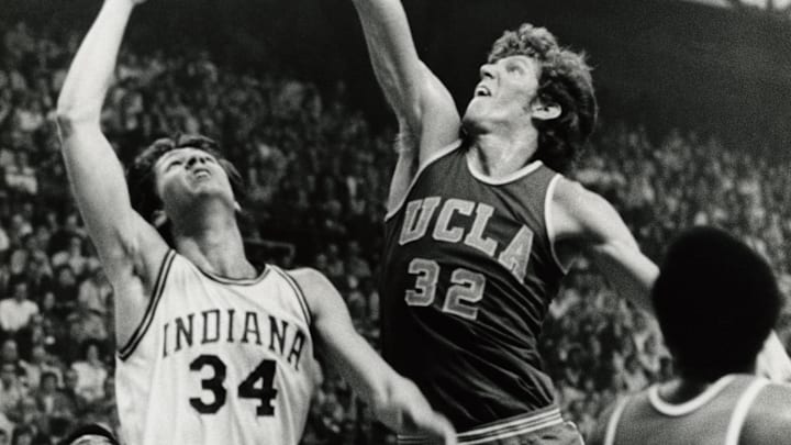 UCLA's Bill Walton (32) Indiana's Steve Green (34) contend for a rebound during the 1973 Final Four. UCLA's Bill Walton (32) Indiana's Steve Green (34) contend for a rebound during the 1973 Final Four.