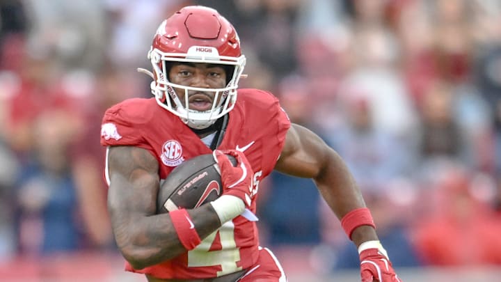 Arkansas Razorbacks running back Mike Washington running against the Texas A&M Aggies at Razorback Stadium in Fayetteville, Ark.
