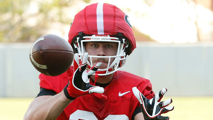 Georgia tight end Jaden Reddell (23) looks to make a catch during spring practice in Athens, Ga., on