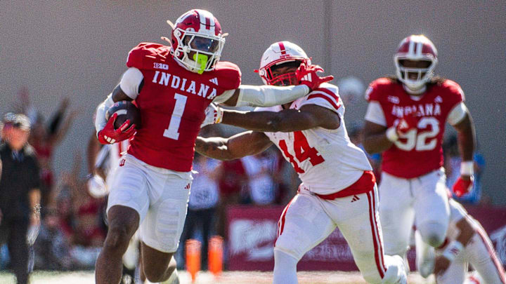 Indiana defensive back Shawn Asbury II returns an interception against Nebraska.