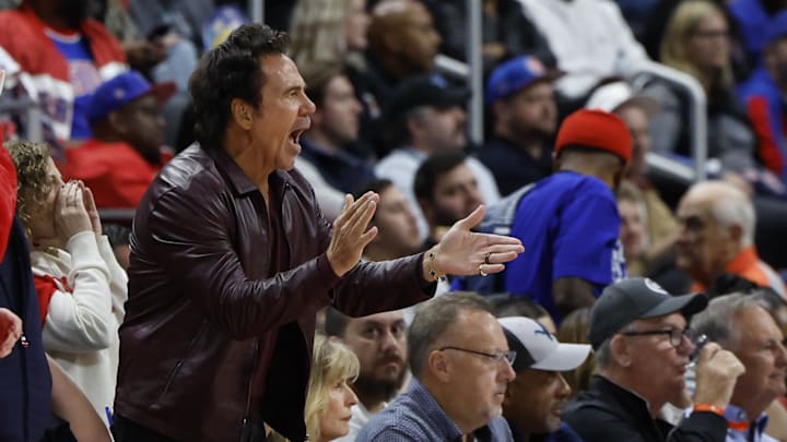 Oct 23, 2024; Detroit, Michigan, USA;  Tom Gores, owner of the Detroit Pistons, cheers in the second half against the Indiana Pacers at Little Caesars Arena. Mandatory Credit: Rick Osentoski-Imagn Images