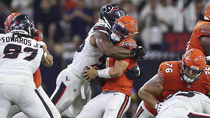 Sep 15, 2024; Houston, Texas, USA; Houston Texans defensive end Danielle Hunter (55) tackles Chicago Bears quarterback Caleb Williams (18) during the fourth quarter at NRG Stadium. Mandatory Credit: Troy Taormina-Imagn Images