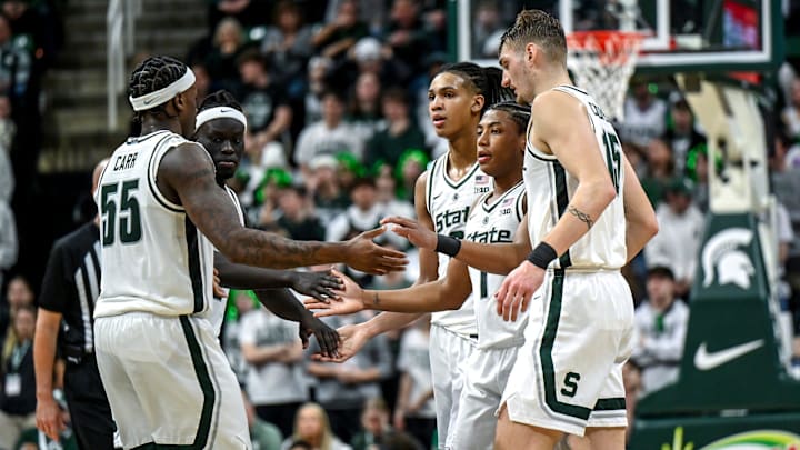 From left, Michigan State's Coen Carr, Kur Teng, Jordan Scott, Jeremy Fears Jr. and Carson Cooper huddle up before a free throw attempt during the second half in the game against Ohio State on Sunday, Feb. 22, 2026, at the Breslin Center in East Lansing.