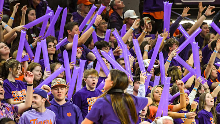 Jan 13, 2024; Clemson, South Carolina, USA; Clemson Tigers fans wave purple balloons during the second half against the Boston College Eagles at Littlejohn Coliseum. Mandatory Credit: Ken Ruinard-Imagn Images