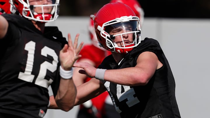 Georgia quarterback Gunner Stockton (14) looks to throw the ball during spring practice in Athens, Ga., on Thursday, March 14, 2024.