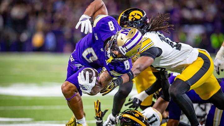 Chris Lawson tries to elude an Iowa tackler in Friday's 41-24 loss. Chris Lawson tries to elude an Iowa tackler in Friday's 41-24 loss.