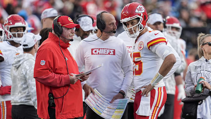 Nov 24, 2024; Charlotte, North Carolina, USA; Kansas City Chiefs head coach Andy Reid talks with quarterback Patrick Mahomes (15) during a time out during the second half against the Carolina Panthers at Bank of America Stadium. Mandatory Credit: Jim Dedmon-Imagn Images