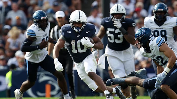 Penn State Nittany Lions running back Nicholas Singleton (10) runs with the ball during the second quarter against the Villanova Wildcats at Beaver Stadium. Penn State Nittany Lions running back Nicholas Singleton (10) runs with the ball during the second quarter against the Villanova Wildcats at Beaver Stadium.