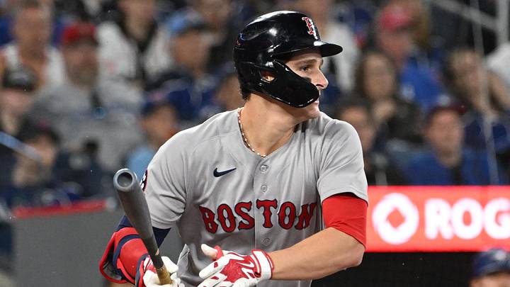 Apr 27, 2026; Toronto, Ontario, CAN;  Boston Red Sox designated hitter Roman Anthony (19) hits an RBI single against the Toronto Blue Jays in the fifth inning at Rogers Centre. Mandatory Credit: Dan Hamilton-Imagn Images