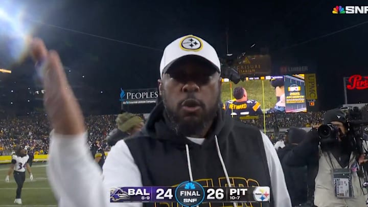 Mike Tomlin celebrating a wild win over the Ravens.