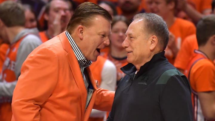Jan 13, 2023; Champaign, Illinois, USA;  Illinois Fighting Illini head coach Brad Underwood, left, shakes hands with Michigan State Spartans head coach Tom Izzo before the first half at State Farm Center. Mandatory Credit: Ron Johnson-Imagn Images