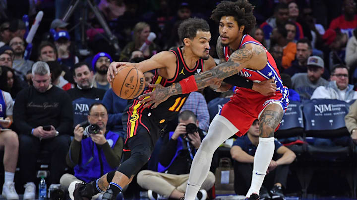 Feb 9, 2024; Philadelphia, Pennsylvania, USA; Atlanta Hawks guard Trae Young (11) is defended by