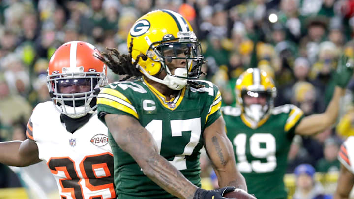 Green Bay Packers wide receiver Davante Adams (17) scores a touchdown against the Cleveland Browns in 2021.