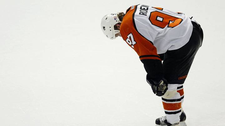TAMPA, FL - MAY 22: Jeremy Roenick #97 of the Philadelphia Flyers hangs his head after losing to the Tampa Bay Lightning in Game seven of the Eastern Conference Finals of the 2004 Stanley Cup Playoffs on May 22, 2004 at the St. Pete Times Forum in Tampa, Florida. The Lightning defeated the Flyers 2-1 to advance to the Stanley Cup Finals. (Photo by Jeff Gross/Getty Images)