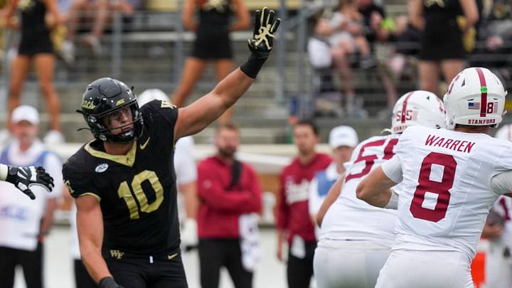 Oct 3, 2026; Winston-Salem, North Carolina, USA; Wake Forest Demon Deacons defensive lineman Gabe Kirschke (10) brings pressure to Stanford Cardinal quarterback Davis Warren (8) during the second half at Allegacy Federal Credit Union Stadium. Mandatory Credit: Jim Dedmon-Imagn Images Oct 3, 2026; Winston-Salem, North Carolina, USA; Wake Forest Demon Deacons defensive lineman Gabe Kirschke (10) brings pressure to Stanford Cardinal quarterback Davis Warren (8) during the second half at Allegacy Federal Credit Union Stadium. Mandatory Credit: Jim Dedmon-Imagn Images