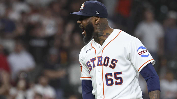 Apr 14, 2026: Houston Astros pitcher Enyel de Los Santos (65) celebrates after the final out during the ninth inning against the Colorado Rockies at Daikin Park. 