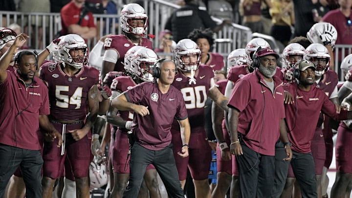 Sep 21, 2024; Tallahassee, Florida, USA; Florida State Seminoles head coach Mike Norvell and his team watch the time tick off of the clock during the fourth quarter against the California Golden Bears at Doak S. Campbell Stadium. Mandatory Credit: Melina Myers-Imagn Images