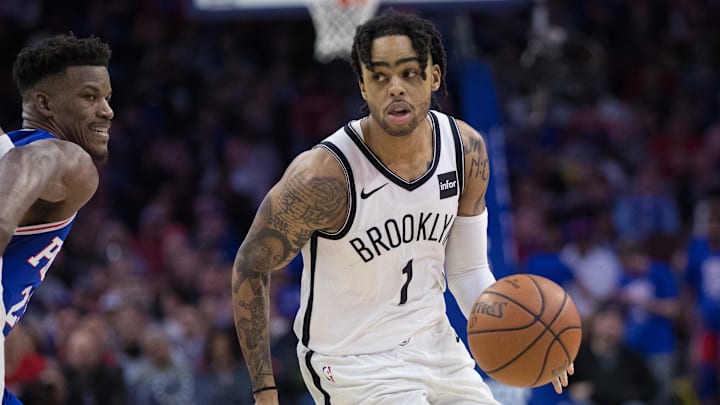 Apr 15, 2019; Philadelphia, PA, USA; Brooklyn Nets guard D'Angelo Russell (1) dribbles against the Philadelphia 76ers during the fourth quarter in game two of the first round of the 2019 NBA Playoffs at Wells Fargo Center. Mandatory Credit: Bill Streicher-Imagn Images