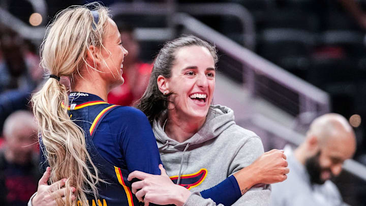 Indiana Fever Sophie Cunningham (8) hugs Indiana Fever Caitlin Clark (22) on Saturday, May 3, 2025, during a preseason game between the Indiana Fever and the Washington Mystics at Gainbridge Fieldhouse in Indianapolis. The Indiana Fever defeated the Washington Mystics in overtime, 79-74. Indiana Fever Sophie Cunningham (8) hugs Indiana Fever Caitlin Clark (22) on Saturday, May 3, 2025, during a preseason game between the Indiana Fever and the Washington Mystics at Gainbridge Fieldhouse in Indianapolis. The Indiana Fever defeated the Washington Mystics in overtime, 79-74.