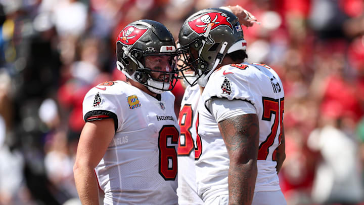 Sep 29, 2024; Tampa, Florida, USA; Tampa Bay Buccaneers offensive tackle Tristan Wirfs (78) congratulates quarterback Baker Mayfield (6) after a touchdown against the Philadelphia Eagles in the second quarter at Raymond James Stadium. Mandatory Credit: Nathan Ray Seebeck-Imagn Images