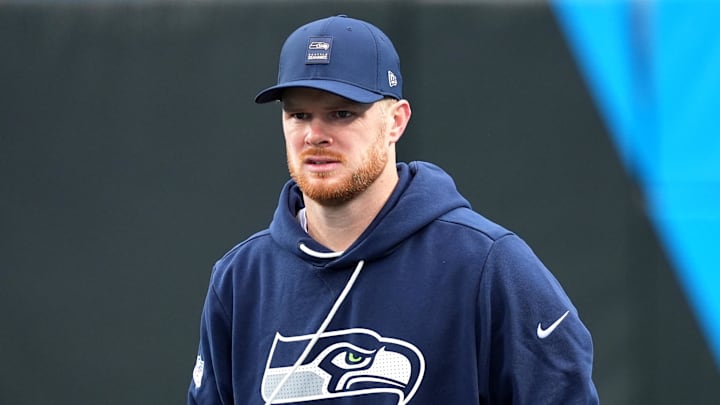 Dec 28, 2025; Charlotte, North Carolina, USA; Seattle Seahawks quarterback Sam Darnold (14) warms up before the game against the Carolina Panthers at Bank of America Stadium. Mandatory Credit: Jim Dedmon-Imagn Images