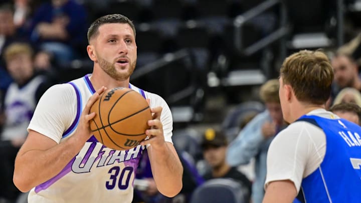 Oct 13, 2025; Salt Lake City, Utah, USA; Utah Jazz center Jusuf Nurkić (30) lines up his shot during the second half over Dallas Mavericks forward Cooper Flagg (32) at Delta Center. Mandatory Credit: Peter Creveling-Imagn Images