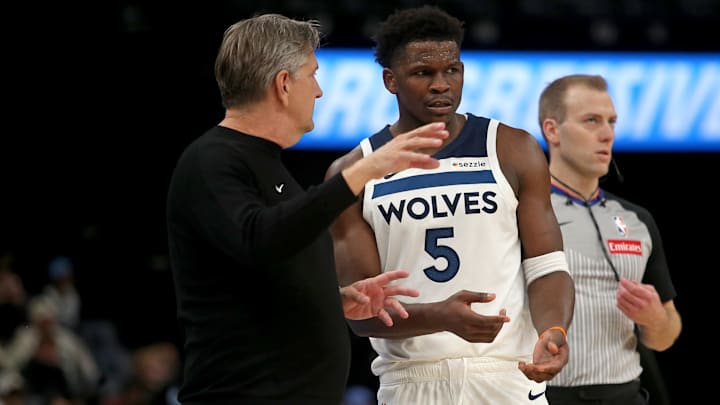 Jan 31, 2026; Memphis, Tennessee, USA; Minnesota Timberwolves guard Anthony Edwards (5) talks with head coach Chris Finch during the fourth quarter against the Memphis Grizzlies at FedExForum.