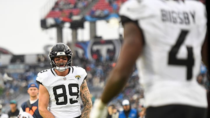 Dec 8, 2024; Nashville, Tennessee, USA;  Jacksonville Jaguars tight end Luke Farrell (89) celebrates the touchdown of running back Tank Bigsby (4) against the Tennessee Titans during the second half at Nissan Stadium. Mandatory Credit: Steve Roberts-Imagn Images