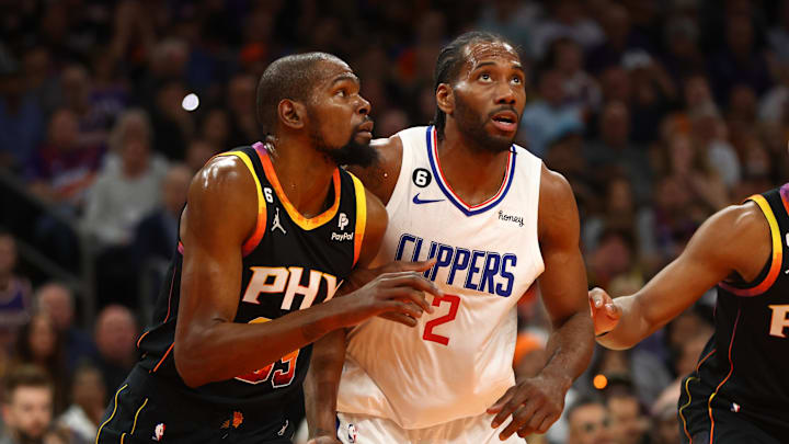 Apr 18, 2023; Phoenix, Arizona, USA; Phoenix Suns forward Kevin Durant (35) against Los Angeles Clippers forward Kawhi Leonard (2) in the first half during game two of the 2023 NBA playoffs at Footprint Center. Mandatory Credit: Mark J. Rebilas-Imagn Images