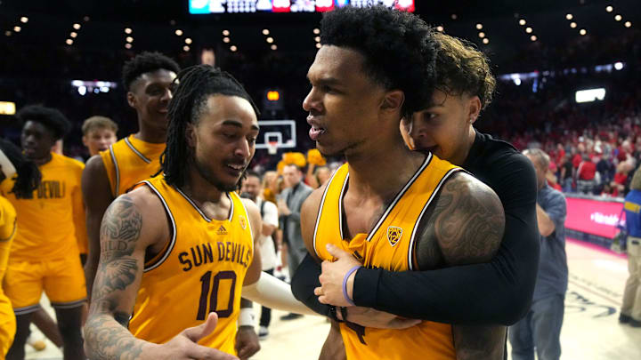 Arizona State San Devils guard Desmond Cambridge Jr. (4) is embraced by his teammates after his buzzer-beating 3-pointer to win 89-88 over the Arizona Wildcats at McKale Center in Tucson on Feb. 25, 2023.
Basketball Asu Ua Mbb Arizona State At Arizona Arizona State San Devils guard Desmond Cambridge Jr. (4) is embraced by his teammates after his buzzer-beating 3-pointer to win 89-88 over the Arizona Wildcats at McKale Center in Tucson on Feb. 25, 2023.
Basketball Asu Ua Mbb Arizona State At Arizona