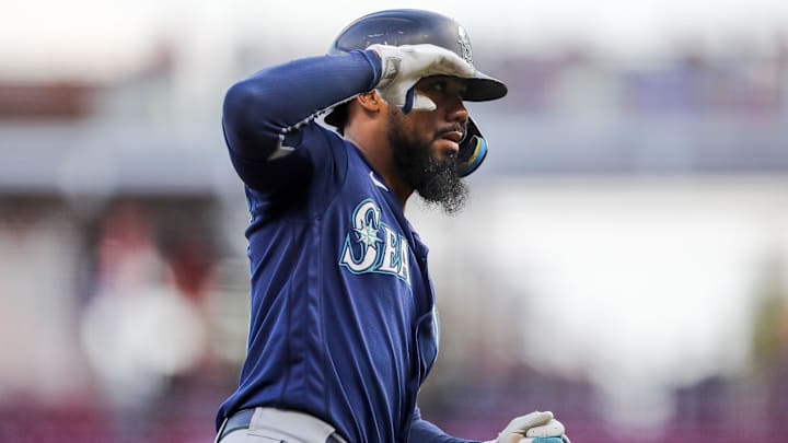 Seattle Mariners right fielder Teoscar Hernandez reacts after hitting a home run against the Cincinnati Reds on Sept. 5, 2023 at Great American Ball Park. Seattle Mariners right fielder Teoscar Hernandez reacts after hitting a home run against the Cincinnati Reds on Sept. 5, 2023 at Great American Ball Park.