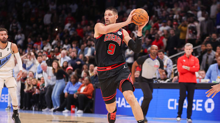 Dec 26, 2024; Atlanta, Georgia, USA; Chicago Bulls center Nikola Vucevic (9) handles the ball against the Atlanta Hawks in the fourth quarter at State Farm Arena. Mandatory Credit: Brett Davis-Imagn Images