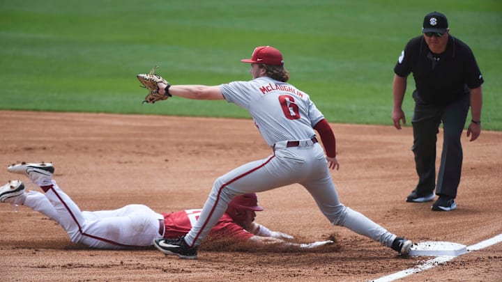 Apr 14, 2024; Tuscaloosa, AL, USA; Alabama base runner Gage Miller (12) is doubled off at first by