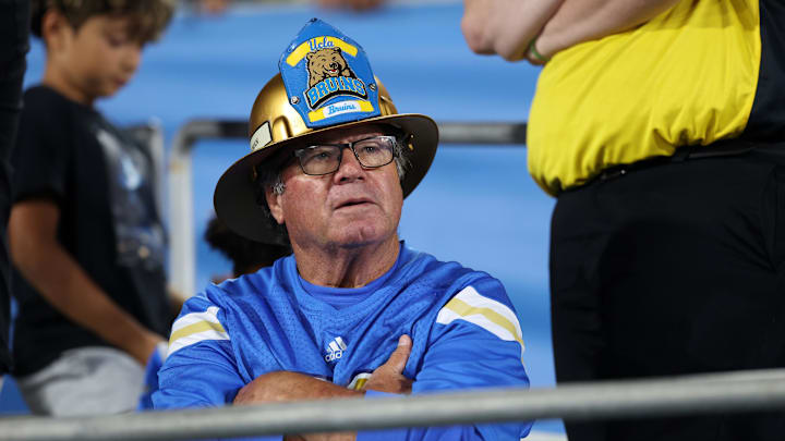 Sep 12, 2025; Pasadena, California, USA; An UCLA Bruins fan looks on during the second half against the New Mexico Lobos at Rose Bowl. Mandatory Credit: Kiyoshi Mio-Imagn Images Sep 12, 2025; Pasadena, California, USA; An UCLA Bruins fan looks on during the second half against the New Mexico Lobos at Rose Bowl. Mandatory Credit: Kiyoshi Mio-Imagn Images