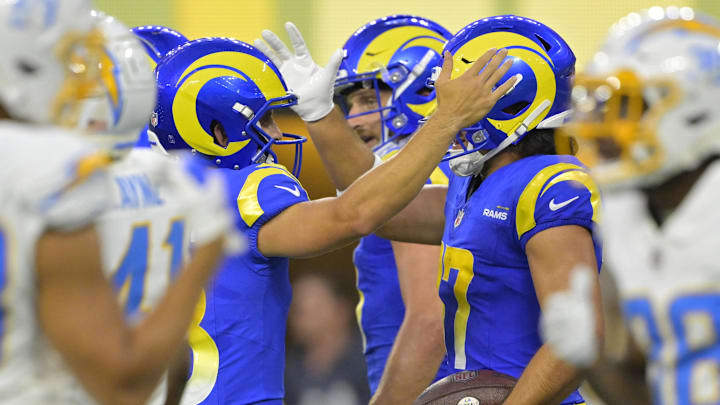Aug 12, 2023; Inglewood, California, USA; Los Angeles Rams wide receiver Puka Nacua (17) is congratulated by quarterback Stetson Bennett (13) after a touchdown in the first half against the Los Angeles Chargers at SoFi Stadium. Mandatory Credit: Jayne Kamin-Oncea-USA TODAY Sports Aug 12, 2023; Inglewood, California, USA; Los Angeles Rams wide receiver Puka Nacua (17) is congratulated by quarterback Stetson Bennett (13) after a touchdown in the first half against the Los Angeles Chargers at SoFi Stadium. Mandatory Credit: Jayne Kamin-Oncea-USA TODAY Sports